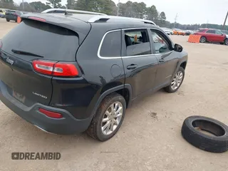 2014 Jeep Cherokee Limited with VIN 1C4PJLDSXEW279356, listed as a IAAI auction lot 41533158 with 115,117 mi miles. Bid and sale history available at carsss.com. Image 4.