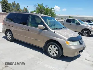 2003 Honda Odyssey EX z VIN 5FNRL18663B026184, wystawiony jako IAAI lot #42258880 z przebiegiem 232 261 mil mil oraz . Historia ofert i sprzedaży dostępna na DreamBid. Obrazek 1.
