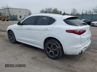 2020 Alfa Romeo Stelvio Ti z VIN ZASPAKBN6L7C92398, wystawiony jako IAAI lot #41924883 z przebiegiem 73 683 mil mil oraz . Historia ofert i sprzedaży dostępna na DreamBid. Obrazek 3.