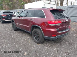 2016 Jeep Grand Cherokee Limited with VIN 1C4RJFBM2GC332845, listed as a IAAI auction lot 42022947 with 119,851 mi miles and . Bid and sale history available at DreamBid. Image 3.