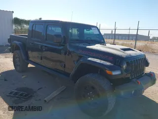 2022 Jeep Gladiator Mojave with VIN 1C6JJTEG7NL180485, listed as a IAAI auction lot 41030779 with 41,445 mi miles and . Bid and sale history available at DreamBid. Image 1.