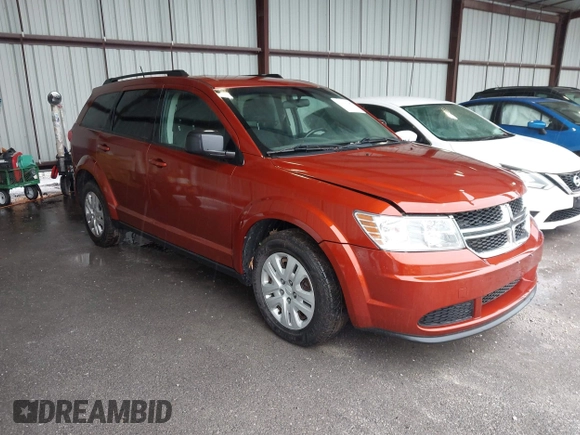 2014 Dodge Journey SE with VIN 3C4PDCAB1ET227003, listed as a IAAI auction lot 42143105 with 212,334 mi miles. Bid and sale history available at carsss.com. Image 1.