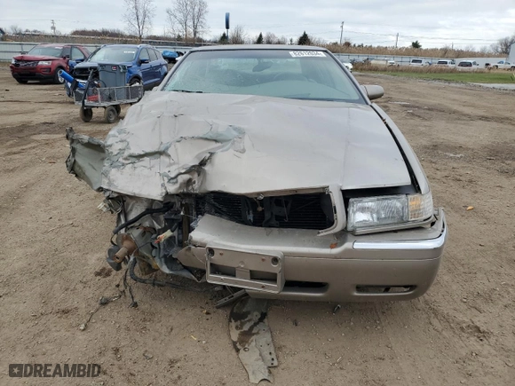 2000 Cadillac Eldorado with VIN 1G6EL12Y5YU166723, listed as a Copart auction lot 82612034 with 80,839 mi miles and Salvage Title. Bid and sale history available at carsss.com. Image 5.