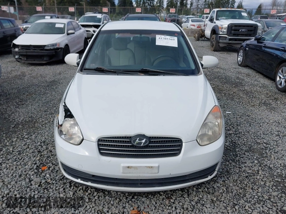 2006 Hyundai Accent GLS with VIN KMHCN46C36U009036, listed as a IAAI auction lot 41705369 with 134,328 mi miles. Bid and sale history available at carsss.com. Image 12.