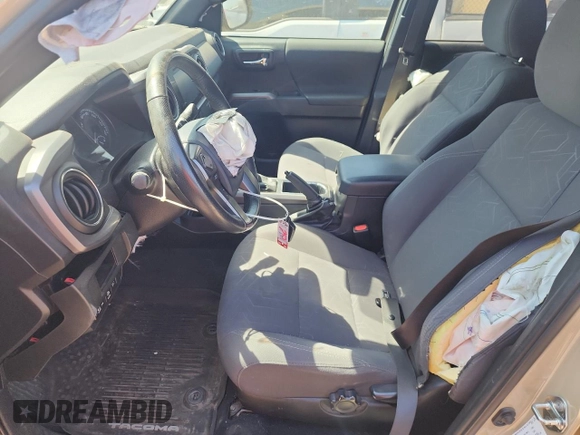 2018 Toyota Tacoma SR with VIN 3TMCZ5AN8JM145862, listed as a Copart auction lot 60190215 with 81,909 mi miles and Salvage title. Bid and sale history available at DreamBid. Image 7.