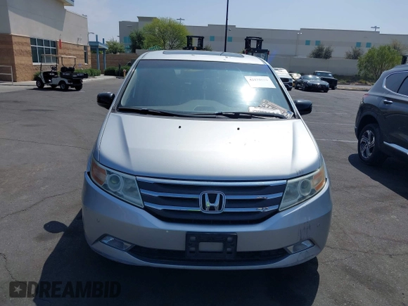 2012 Honda Odyssey Touring с VIN 5FNRL5H91CB004546, выставлен на аукционе IAAI как лот 42175002 с пробегом 118 719 миль миль и . История ставок и продаж доступна на DreamBid. Изображение 12.