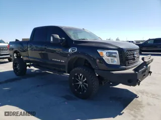2019 Nissan Titan XD SV with VIN 1N6BA1F44KN519853, listed as a Copart auction lot 73829234 with 135,460 mi miles and Salvage Title. Bid and sale history available at carsss.com. Image 4.
