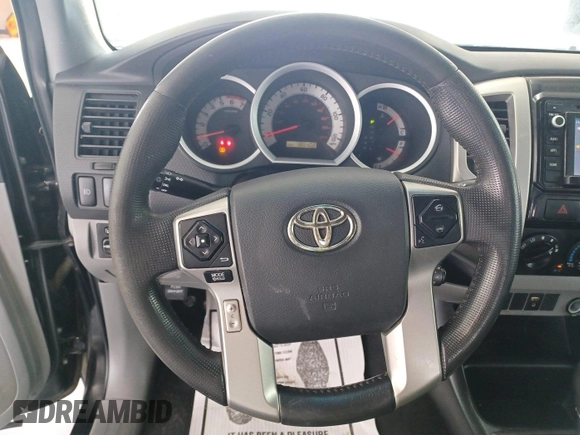 2014 Toyota Tacoma with VIN 3TMMU4FN8EM068633, listed as a IAAI auction lot 42727713 with 185,402 mi miles and . Bid and sale history available at DreamBid. Image 11.