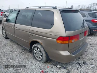 2004 Honda Odyssey EX z VIN 5FNRL18634B004127, wystawiony jako IAAI lot #41854878 z przebiegiem 242 601 mil mil oraz . Historia ofert i sprzedaży dostępna na DreamBid. Obrazek 3.
