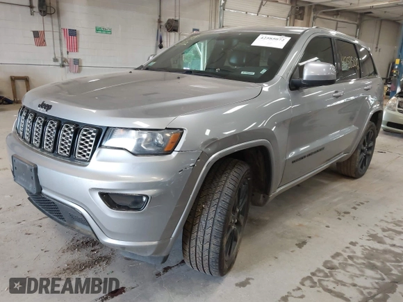 2018 Jeep Grand Cherokee Laredo E with VIN 1C4RJFAG7JC203793, listed as a IAAI auction lot 42585072 with 263,987 mi miles and . Bid and sale history available at DreamBid. Image 2.