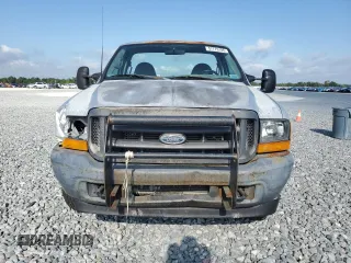 2001 Ford F-250 XL with VIN 1FTNF21L11EC49565, listed as a Copart auction lot 57776185 with 110,842 mi miles and Salvage title. Bid and sale history available at DreamBid. Image 5.