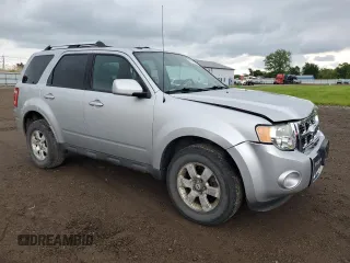 2011 Ford Escape Limited с VIN 1FMCU0E76BKA26306, выставлен на аукционе Copart как лот 57873275 с пробегом 105 971 миль миль и Списание • Salvage title. История ставок и продаж доступна на DreamBid. Изображение 4.