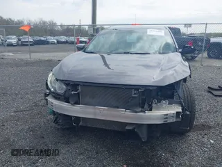2016 Honda Civic Sedan LX with VIN 2HGFC2F51GH524197, listed as a IAAI auction lot 42012886 with 103,302 mi miles. Bid and sale history available at carsss.com. Image 13.