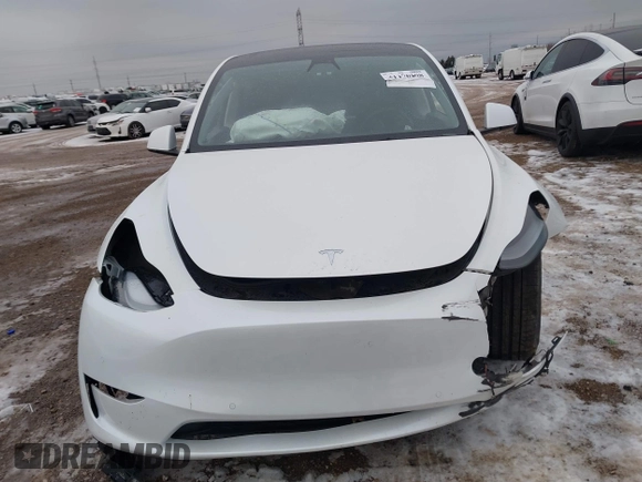 2021 Tesla Model Y Performance with VIN 5YJYGDEF6MF261711, listed as a IAAI auction lot 41176208 with 25,687 mi miles and . Bid and sale history available at DreamBid. Image 12.
