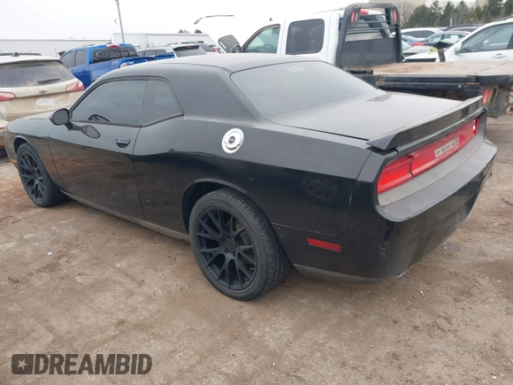 2013 Dodge Challenger SXT z VIN 2C3CDYAGXDH718768, wystawiony jako IAAI lot #41339735 z przebiegiem 187 052 mil mil oraz . Historia ofert i sprzedaży dostępna na DreamBid. Obrazek 3.