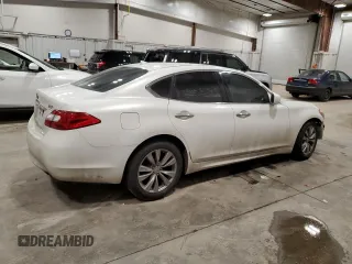 2013 Infiniti M z VIN JN1BY1AP8DM511833, wystawiony jako Copart lot #42874265 z przebiegiem 152 708 mil mil oraz Czysty tytuł • Clean title. Historia ofert i sprzedaży dostępna na DreamBid. Obrazek 3.