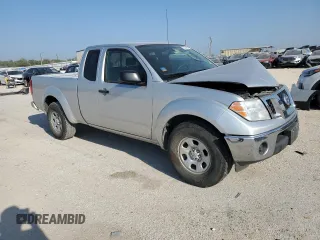 2010 Nissan Frontier XE with VIN 1N6BD0CT1AC427994, listed as a Copart auction lot 71574484 with 121,102 mi miles and Salvage title. Bid and sale history available at DreamBid. Image 4.