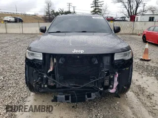 2015 Jeep Grand Cherokee Summit with VIN 1C4RJFJGXFC150773, listed as a Copart auction lot 50631975 with 171,809 mi miles and Salvage Title. Bid and sale history available at carsss.com. Image 5.