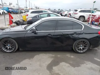 2018 BMW 3 Series 330i xDrive with VIN WBA8D9G57JNU67415, listed as a IAAI auction lot 41513343 with 98,714 mi miles. Bid and sale history available at carsss.com. Image 14.