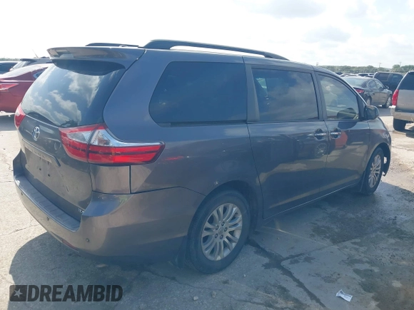2015 Toyota Sienna XLE with VIN 5TDYK3DC6FS542504, listed as a IAAI auction lot 42569992 with 113,004 mi miles and . Bid and sale history available at DreamBid. Image 4.