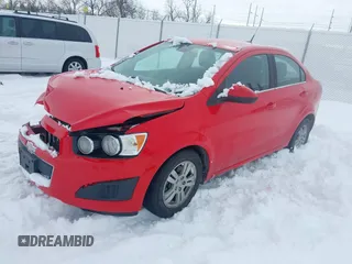 2014 Chevrolet Sonic LT with VIN 1G1JC5SH3E4148938, listed as a IAAI auction lot 41614802 with 135,847 mi miles and . Bid and sale history available at DreamBid. Image 2.