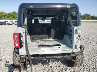 2024 Ford Bronco Wildtrak с VIN 1FMEE2BPXRLB16732, выставлен на аукционе Copart как лот 56394005 с пробегом 8 428 миль миль и Списание • Salvage title. История ставок и продаж доступна на DreamBid. Изображение 6.