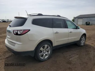 2013 Chevrolet Traverse LTZ z VIN 1GNKVLKD6DJ107802, wystawiony jako Copart lot #58519305 z przebiegiem 157 046 mil mil oraz Czysty tytuł • Clean title. Historia ofert i sprzedaży dostępna na DreamBid. Obrazek 3.