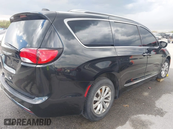 2018 Chrysler Pacifica Touring L with VIN 2C4RC1BG9JR120790, listed as a IAAI auction lot 41998460 with 124,146 mi miles and . Bid and sale history available at DreamBid. Image 4.