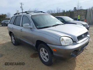 2004 Hyundai Santa Fe GLS with VIN KM8SC13D74U700404, listed as a IAAI auction lot 41735889 with 208,946 mi miles. Bid and sale history available at carsss.com. Image 1.