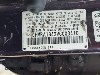 1997 Honda Odyssey z VIN JHMRA1842VC003410, wystawiony jako IAAI lot #42456828 z przebiegiem 280 657 mil mil oraz . Historia ofert i sprzedaży dostępna na DreamBid. Obrazek 9.