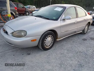 1999 Mercury Sable GS с VIN 1MEFM50U6XA655488, выставлен на аукционе IAAI как лот 42667715 с пробегом 200 917 миль миль и . История ставок и продаж доступна на DreamBid. Изображение 2.