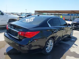 2015 Infiniti Q50 Premium with VIN JN1BV7AP9FM355526, listed as a IAAI auction lot 42010401 with 67,131 mi miles. Bid and sale history available at carsss.com. Image 4.