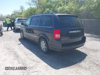 2010 Chrysler Town & Country Touring with VIN 2A4RR5D10AR282784, listed as a IAAI auction lot 42231696 with 173,049 mi miles and . Bid and sale history available at DreamBid. Image 3.