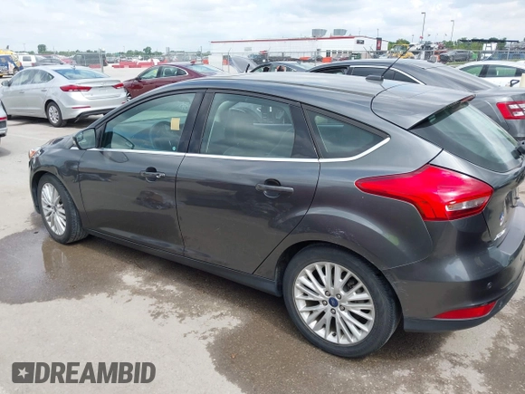 2018 Ford Focus Titanium with VIN 1FADP3N28JL323825, listed as a IAAI auction lot 42341286 with 46,565 mi miles and . Bid and sale history available at DreamBid. Image 14.