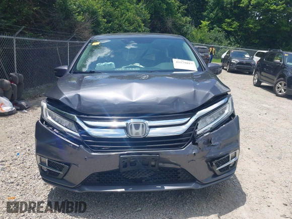2018 Honda Odyssey Elite with VIN 5FNRL6H95JB087952, listed as a IAAI auction lot 42579817 with 96,577 mi miles and . Bid and sale history available at DreamBid. Image 13.
