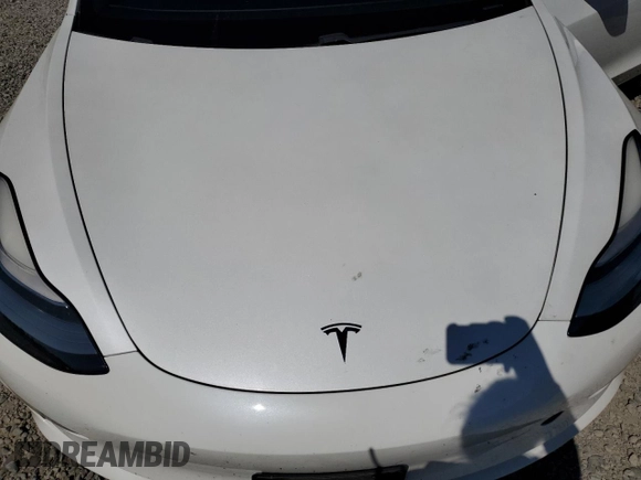 2020 Tesla Model 3 Long Range z VIN 5YJ3E1EB3LF787160, wystawiony jako Copart lot #58626965 z przebiegiem Nie podano mil oraz Szkoda całkowita • Salvage title. Historia ofert i sprzedaży dostępna na DreamBid. Obrazek 11.