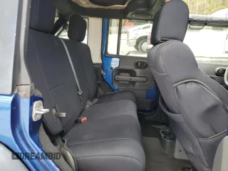 2009 Jeep Wrangler Unlimited Rubicon with VIN 1J4GA69169L762992, listed as a Copart auction lot 51674355 with 147,181 mi miles and Salvage title. Bid and sale history available at DreamBid. Image 11.