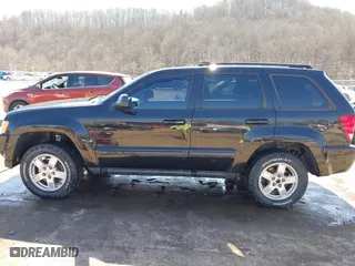 2007 Jeep Grand Cherokee Laredo with VIN 1J8GR48K67C523705, listed as a IAAI auction lot 41774281 with 215,572 mi miles. Bid and sale history available at carsss.com. Image 15.