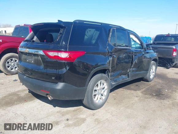 2021 Chevrolet Traverse LT Cloth with VIN 1GNERGKW5MJ197065, listed as a IAAI auction lot 41861029 with 57,992 mi miles. Bid and sale history available at carsss.com. Image 4.