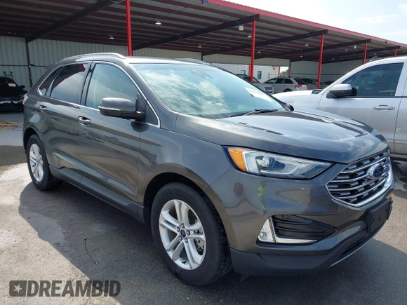 2020 Ford Edge SEL z VIN 2FMPK3J9XLBA54556, wystawiony jako IAAI lot #42179907 z przebiegiem 63 449 mil mil oraz . Historia ofert i sprzedaży dostępna na DreamBid. Obrazek 1.