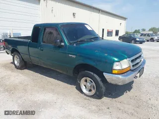1999 Ford Ranger XLT with VIN 1FTZR15X7XPA71738, listed as a IAAI auction lot 42071163 with 225,035 mi miles. Bid and sale history available at carsss.com. Image 1.