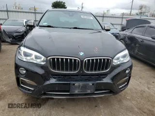 2016 BMW X6 xDrive35i with VIN 5UXKU2C58G0N83832, listed as a Copart auction lot 66239363 with 98,263 mi miles. Bid and sale history available at carsss.com. Image 5.