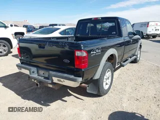 2002 Ford Ranger XL Fleet with VIN 1FTZR45E42PB55766, listed as a IAAI auction lot 41667553 with 270,812 mi miles. Bid and sale history available at carsss.com. Image 4.