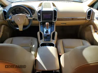2012 Porsche Cayenne with VIN WP1AA2A20CLA02006, listed as a Copart auction lot 49129885 with 143,605 mi miles and Salvage title. Bid and sale history available at DreamBid. Image 8.