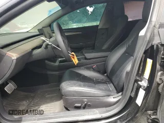 2023 Tesla Model 3 Performance z VIN 5YJ3E1EC9PF414218, wystawiony jako Copart lot #53105285 z przebiegiem 60 745 mil mil oraz Szkoda całkowita • Salvage title. Historia ofert i sprzedaży dostępna na DreamBid. Obrazek 7.