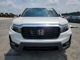 2023 Honda Ridgeline RTL-E with VIN 5FPYK3F7XPB027874, listed as a Copart auction lot 63771315 with 11,945 mi miles and Salvage title. Bid and sale history available at DreamBid. Image 5.