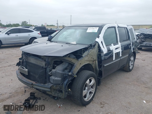 2012 Honda Pilot EX-L with VIN 5FNYF4H52CB070811, listed as a IAAI auction lot 41938672 with 156,446 mi miles and . Bid and sale history available at DreamBid. Image 2.