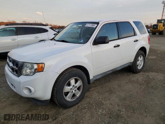 2010 Ford Escape XLS with VIN 1FMCU9C71AKC41887, listed as a Copart auction lot 87117884 with 126,687 mi miles and Clean title. Bid and sale history available at DreamBid. Image 1.