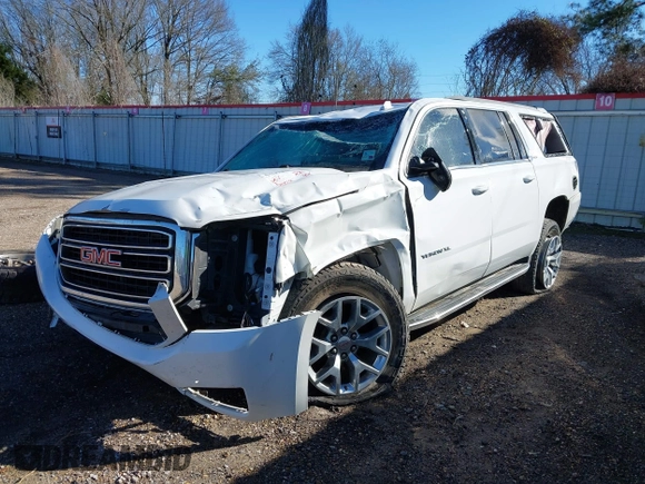 2019 GMC Yukon XL SLT with VIN 1GKS1GKC1KR335082, listed as a IAAI auction lot 41652504 with 135,824 mi miles. Bid and sale history available at carsss.com. Image 6.