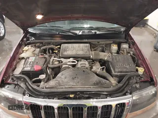 2000 Jeep Grand Cherokee Laredo z VIN 1J4GW48N8YC151600, wystawiony jako IAAI lot #42178535 z przebiegiem 71 207 mil mil oraz . Historia ofert i sprzedaży dostępna na DreamBid. Obrazek 10.